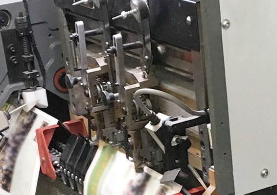 中綴じ用の機械